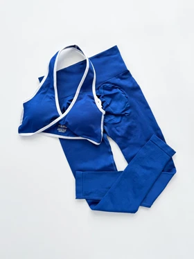 ست ورزشی سیملس نیم‌تنه کاپ‌دار بند گردنی نواردوزی و لگ پشت چروک