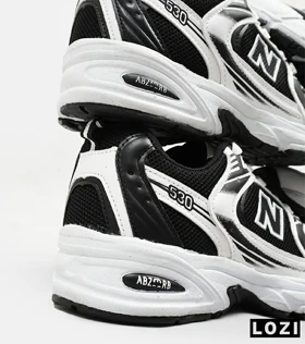کفش کتانی مردانه و زنانه سفید مشکی NEW BALANCE 530