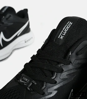 کفش کتانی مردانه مشکی سفید NIKE zoom x