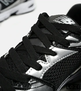 کفش کتانی مردانه و زنانه مشکی نقره ای NEW BALANCE 530 مدل 5508