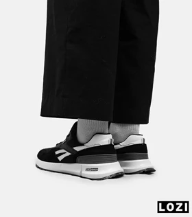 کفش کتانی مشکی سفید REEBOK Unphased Pro