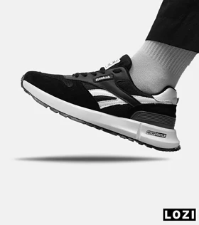 کفش کتانی مشکی سفید REEBOK Unphased Pro