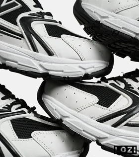 کفش کتانی مردانه و زنانه سفید مشکی NEW BALANCE 530
