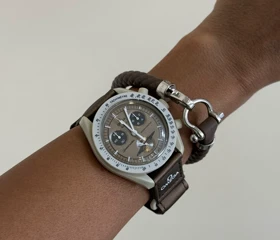 ساعت امگا سواچ زحل کرم قهوه ای Omega Swatch to Saturn