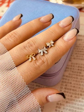 پیرسینگ گوش پاپیون