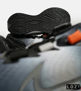 کفش کتانی مردانه و زنانه مشکی بادمجانی NIKE RUNNING DISK PRO