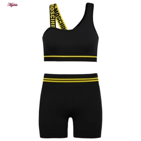 ست نیم‌تنه و شلوارک ورزشی زنانه مدل سیملس پشت چین‌دار کد 5562-2333