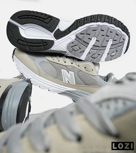 کفش کتانی بزرگ پا کرم طوسی NEW BALANCE 993
