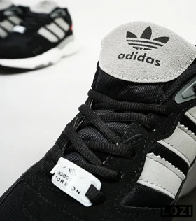 کفش کتانی مردانه مشکی ADIDAS torsion