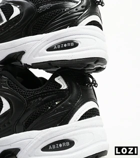 کفش کتانی زنانه و مردانه مشکی سفید NEW BALANCE 530 مدل 4124