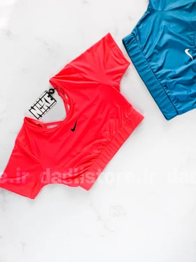 کراپ تاپ وزرشی آستین کوتاه پشت‌باز بندی نایکی Nike
