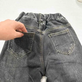 شلوار جین بچه گانه کمرکش زغالی زاپ‌دار