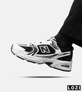 کفش کتانی مردانه و زنانه سفید مشکی NEW BALANCE 530