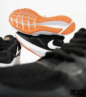 کفش کتانی زنانه و مردانه مشکی نارنجی Nike guide 10