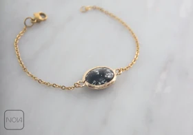 دستبند استیل سنگ مشکی نقره‌ای