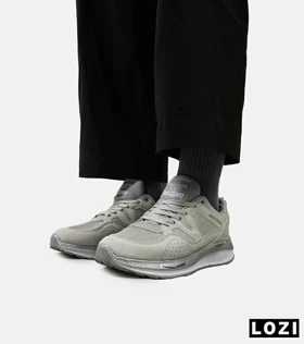 کفش کتانی طبی زنانه و مردانه طوسی سفید SKECHERS archfit v02 مدل 4821
