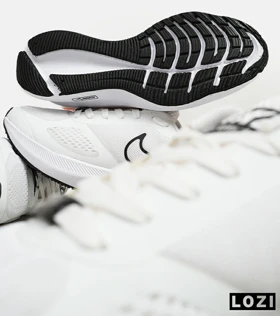 کفش کتانی مردانه و زنانه سفید مشکی نارنجی Nike guide 10