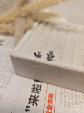 پیرسینگ گوش میکی موس و قلب