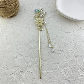 کانزاشی مو زنانه فلزی مدل لومیرا طرح گل کریستالی با آویز مروارید