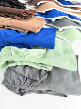 ست ورزشی سیملس نیمتنه کاپدار بند گردنی نواردوزی و لگ پشت چروک