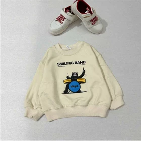 بلوز دورس کرم SMILING BAND طرح هیولا