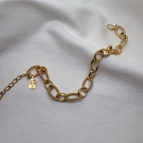 دستبند برند شین مدل «بیضی خاویاری» | با آبکاری طلای 24 عیار و بافت برجسته