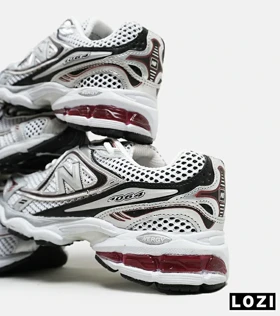 کفش کتانی مردانه و زنانه سفید مشکی NEW BALANCE 1064 مدل 5624