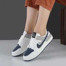 کفش و کتانی زنانه مدل دو نایک رنگ سفید سرمه ای مدل نایک NIKE