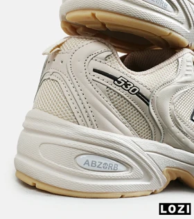 کفش کتانی مردانه و زنانه کرم NEW BALANCE 530