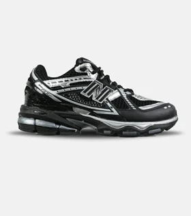 کفش کتانی مردانه و زنانه مشکی سفید New Balance 1906R مدل 7545