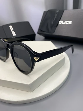 عینک آفتابی پلیس Police مدل SPLF31 سبک و مقاوم با عدسی پلاریزه و حفاظت UV400