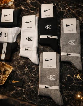 جوراب ساق بلند مردانه طرح ck برند نایکی 12 جفتی فری سایز