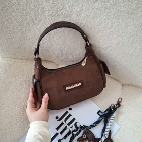 کیف رودوشی زنانه جیر قهوهای مدل هوبو