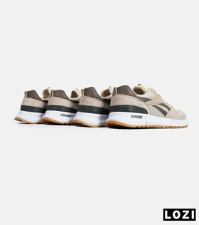 کفش کتانی قهوه ای کرم REEBOK Unphased Pro