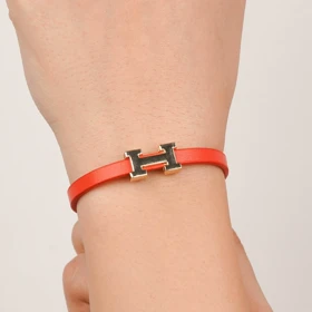 دستبند چرم استیل Hermes رنگ نارنجی
