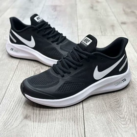 کتانی مردانه زنانه مدل نایک ایر زوم گاید nike air zoom guide رانینگ رنگ مشکی سفید