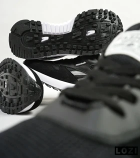 کفش کتانی مشکی REEBOK Unphased Pro
