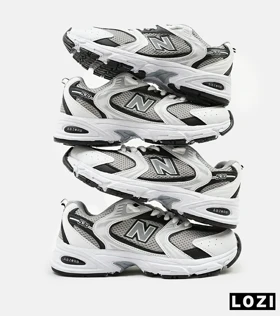 کفش کتانی مردانه و زنانه سفید خاکستری NEW BALANCE 530