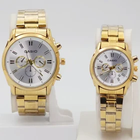 ساعت مچی ست مردانه و زنانه کاسیو Casio سبک 3موتوره و تمام استیل 5594 (بند و قاب طلایی صفحه نقره ای)
