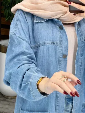 مانتو جین دو جیب پایین برش‌دار