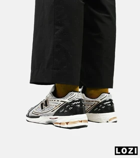 کفش کتانی سفید سرمه ای Newbalance 1906R
