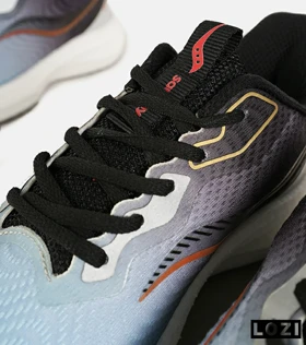 کفش کتانی طوسی آبی Saucony Ride Review