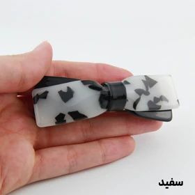 گیره مو دخترانه مدل پاپیون خال‌خالی (سفید)