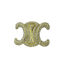 گل سینه زنانه مدل سلین نگیندار طلایی
