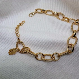 دستبند برند شین مدل «بیضی خاویاری» | با آبکاری طلای 24 عیار و بافت برجسته