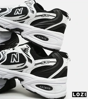 کفش کتانی مردانه و زنانه سفید مشکی NEW BALANCE 530 مدل 3144