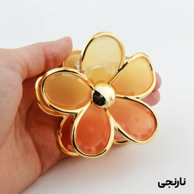 کلیپس دخترانه مدل گل دور شیشه ای دو رنگ (نارنجی)