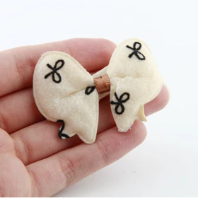 گیره مو دخترانه مدل پاپیونی (کرم)