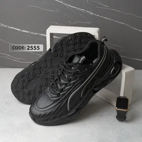 کتانی چرم بنددار مشکی زیره ژله ای مشکی سایز بزرگ PUMA