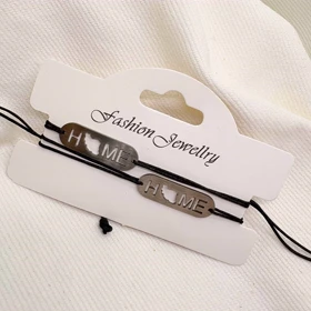 دستبند استیل مدل «HOME - ایران» | بند بافت مشکی با پلاک نقره‌ای